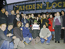 Traders protest in front of the iconic mural  