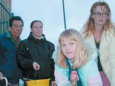 From left, freezing residents Amanda Cave, Maya Hemmings and her mother Daria