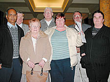 Tracy Stinton (centre with petition) and fellow protesters Syed Haque, Francis McNamara, David Roche, Megan Purver, Ewart Field, Mick Farrant  