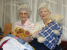 Bobbie Page and Tere Brown help out on the clothes stall