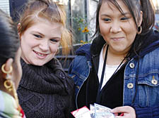 A member of the Fitzrovia Youth In Action team taking part in the Peer-to-Peer street marketing project, which involved taking to the streets to hand out information on drugs to other youngsters