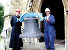 Father Andrew Meldrum and John Thorp    