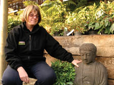 Denise Matthew with a statue similar to those stolen on Sunday night