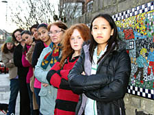 Kentish Town Community Centre members, from right, Jennifer Tang, Finn Donovan, Ethel Horacek, Leyla Keba, with her mother centre worker Nuru Keba and sister Ayda Keba, manager Justina Forristal and Jane Donovan