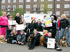 Terence and Tara McGirr with children demanding return of Bishop