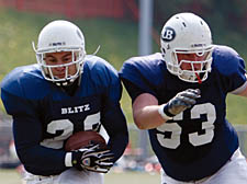 Debutant Jonathan Chilton scores his first touchdown for the Blitz, behind the block of team-mate Owen Powis.