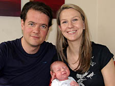 Murray and Alla with new arrival Zac; inset: Alla's father, Yuri Ouvarov