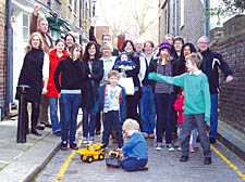 Little Green Street neighbours and supporters  celebrate the decision to ban lorries