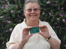 Angela Litchfield, left, holding her blood donor card