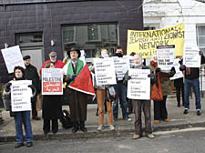 Protesters opposite David Miliband's house on Friday