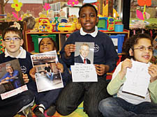 Frank Barnes pupils Samuel (10), Faithful (5), Deon (10), Jessica (8) with some of the auction lots