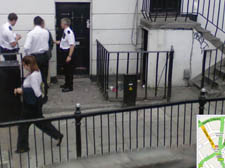 Bayham Street at the junction of Camden Road, where a man appears to be under arrest