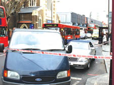 The removals van blocks in the getaway vehicle