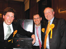 Tom Simon, left, celebrates his win with Ed Fordham and Keith Moffitt