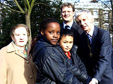 Mirjam Finkelstein with Francine Mahilu, 9, and Jeron Worrel, 9, from St John the Evangelist School and council leader James Kempton and Deputy Mayor Lib Dem councillor Stefan Kasprzyk