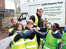 St Joseph’s Primary pupils Cian Grunfield, Caitlin Snellgrove-McGahan, Alex Badcott, Juilio Quatela, Georgia Higgins and Eric Agyemang with an Islington Council graffiti officer