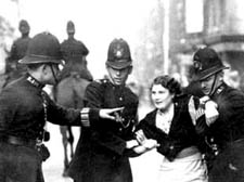 An anti-fascist protester is dragged away by police 