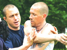 Mark Bowen, right, is put through his paces by British Military Fitness instructor Ian McClelland in Hyde Park