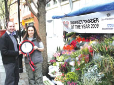 Leanne Gellel receives her award from Councillor Daniel Astaire, Westminster's cabinet member for community protection.