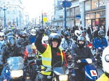 Two-wheeled protesters command the streets during last Monday's go-slow ride