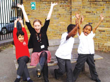 Service manager Caroline Brealey with children at the play centre